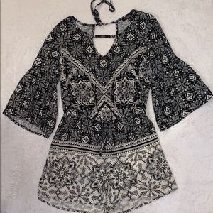 Black and cream patterned romper